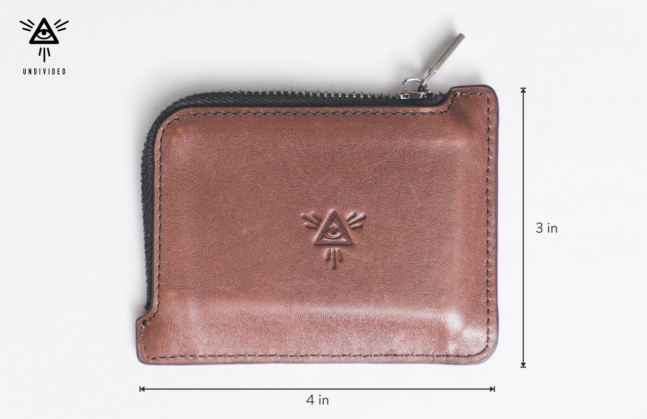 Undivided Wallet  - Dimensions

Not too wide or too narrow - it's perfectly proportioned to easily fit into your pocket but also not fall right out of your pocket

